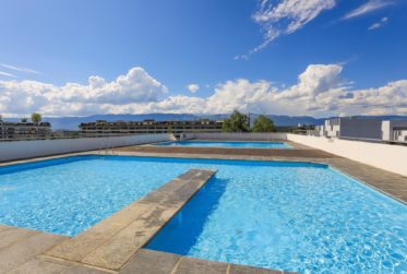 Appartement d'exception en angle avec vue panoramique sur le lac et le Mont-Blanc